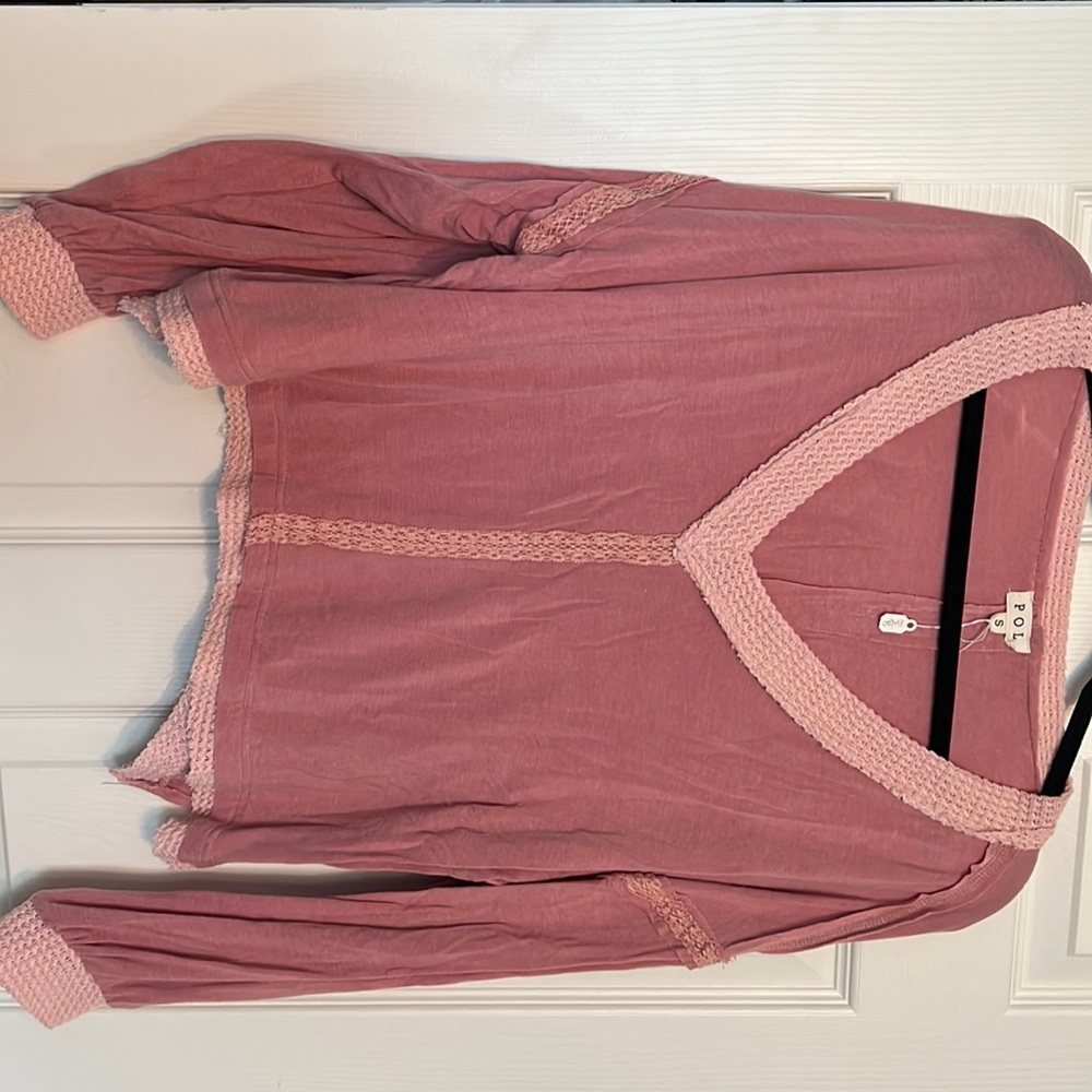 Women’s POL shirt size small.